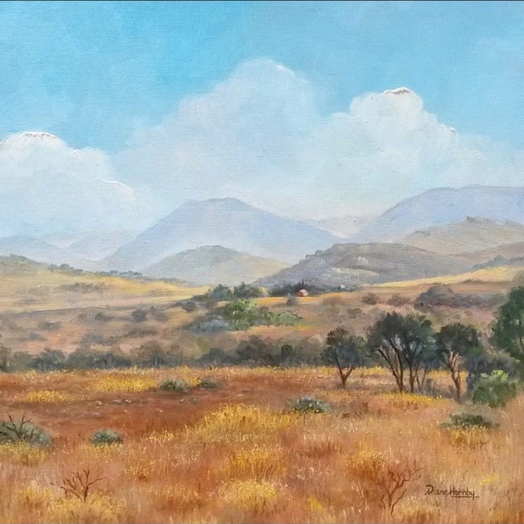 Oil painting of the South African bushveld with distant mountains